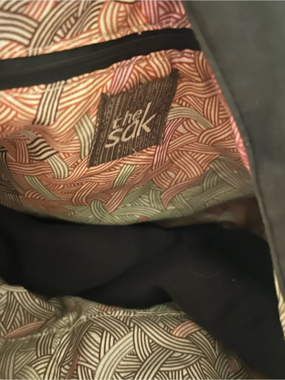 The Sak Black Leather Hobo Bag with Brown Trim